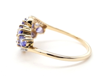 Preview: 9 Karat AA Tansanit Damen Ring 20 x Zirkon 375 Gold 1,25 ct. 60 - 19,0 mm Ø Preview: 9 Karat AA Tansanit Damen Ring 20 x Zirkon 375 Gold 1,25 ct. 60 - 19,0 mm Ø